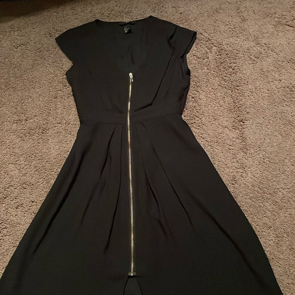 Black mini dress by H&M.